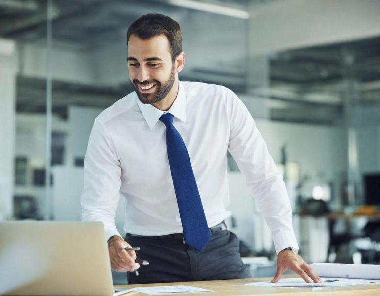 Bronze sign reading "my career starts here" on a stone wall.